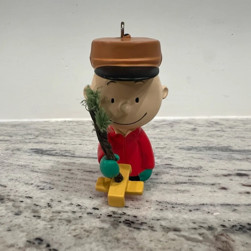 Hallmark Peanuts Charlie Brown Kneeling with Tree ornament
